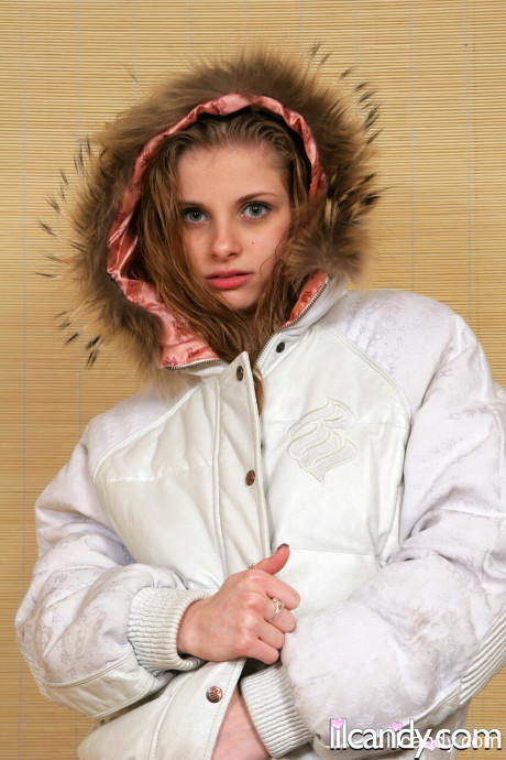 Skinny babe Lil Candy shows her tiny boobies while posing in her winter jacket - #235909