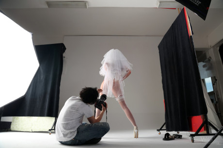 Slim young Little Caprice poses in stockings & chocolate at a photo shoot - #16437