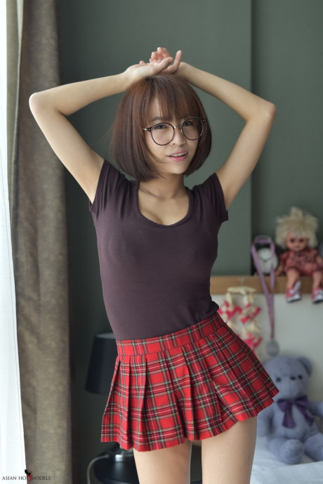 Pretty lovely asian teenie flaunts her hot ass wearing a miniskirt and panties - #118144