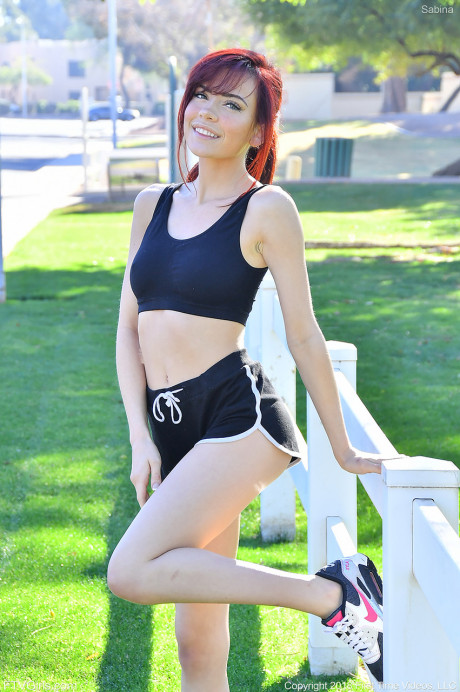 Frisky redhead young Sabina strips in public and does yoga ass naked - #137301