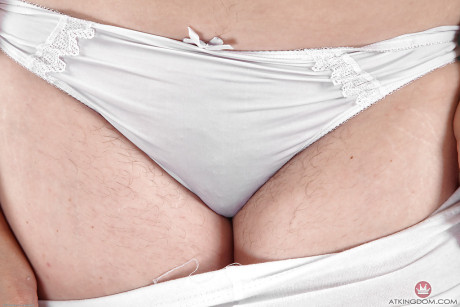 Cougar girl Mel Harper slips out of spandex pants and panties to expose beaver - #235657