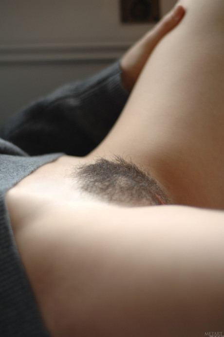 Brunette babe with a bushy cunt Brionie W shows her small boobies in a solo - #49044