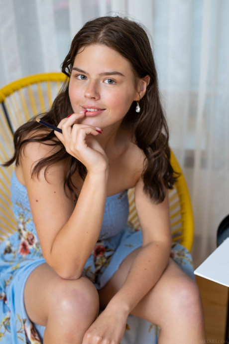 Cute teenie with natural boobs Reva reveals her shaved snatch and poses on a chair - #190482