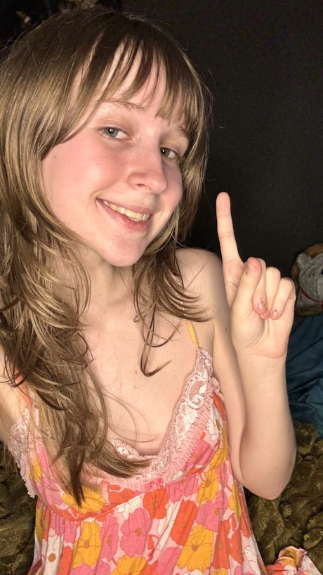 Cute amateur teenie Teensy Bella poses seductively in her nightgown