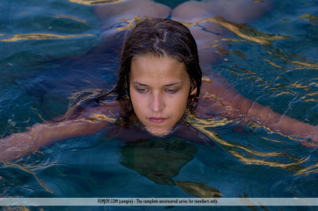 Naked teen Simona sinks to her neck in crystal clear water - #75990