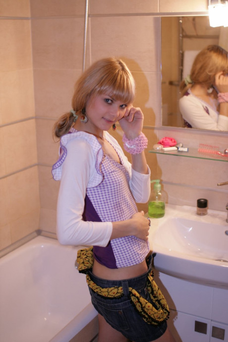 Innocent teenie babe Katie washes her slender body before putting her clothes on - #212015