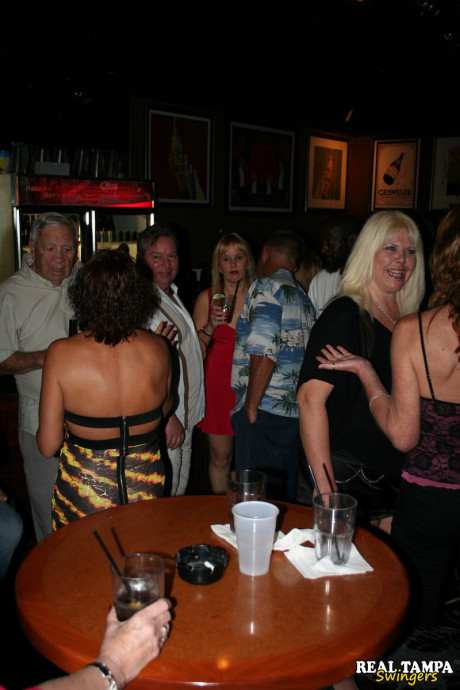 Insatiable swinger wives show off their huge boobs and lick hard dongs in public - #21650
