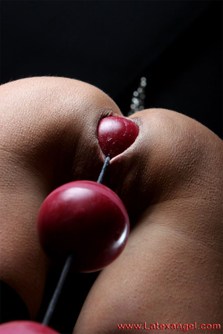 Restrained brunette drools while ball gagged and popping out anal beads - #105628