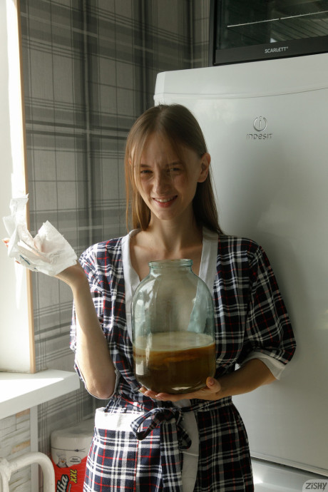 Slim teen Ariel Gossimer shows her amazing behind while posing by the window - #256789