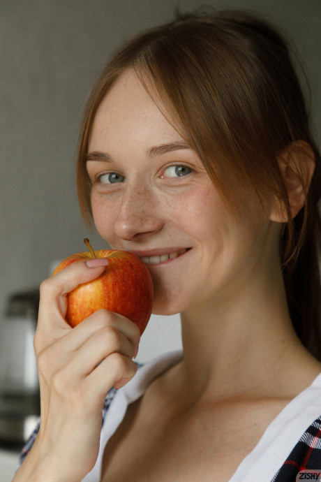 Slim teen Ariel Gossimer shows her amazing behind while posing by the window - #256792