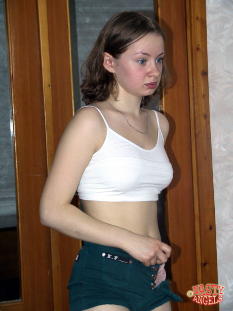 Young teenie lesbians Marina and Nika strip and kiss in front of a camera - #18983