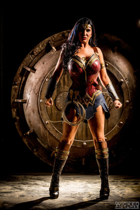 Slutty MILF in a Wonder woman costume Romi Rain gets rammed by three guys - #137438
