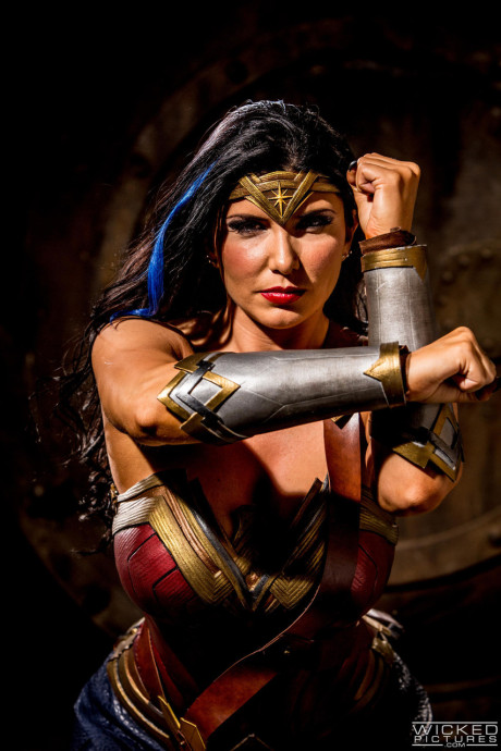 Slutty MILF in a Wonder woman costume Romi Rain gets rammed by three guys - #137439