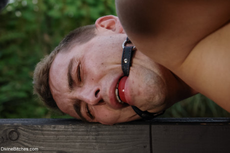 Romanian femdom Sandra Romain slaps and rides her slave's butt on the bridge - #99440