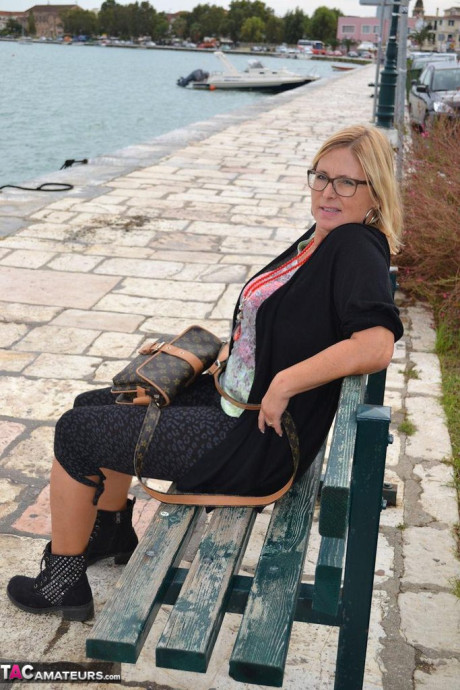 Hugely busty mature lady Chrissy swims and lounges at the beach stark naked - #182319