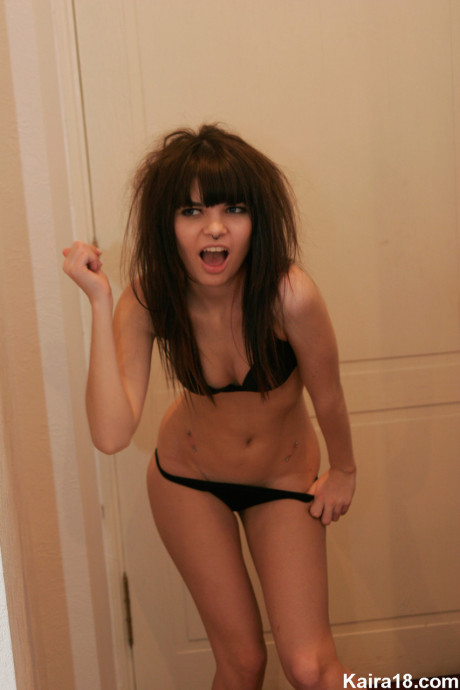 Petite young Kaira 18 smokes a cigarette before stripping naked - #47663