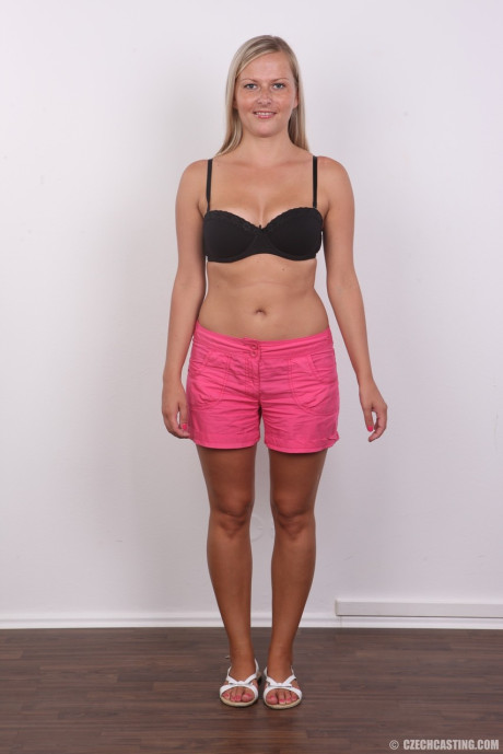 Amateur blondy Petra doffs her black bra and panties for a naked mugshot #6019
