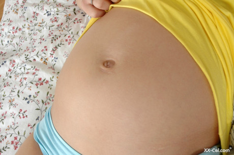 Amateur pregnant skank GF chick Charlotte Pelucci shows her pussy and butthole on a bed - #237401