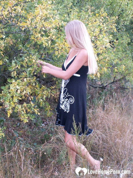 Naughty yellow-haired strips undressed & shows off her tanned breasts outdoors - #224912