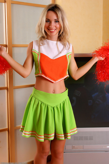 Thin cheerleader Natalia takes off her uniform & spreads her bushy cunt - #26306