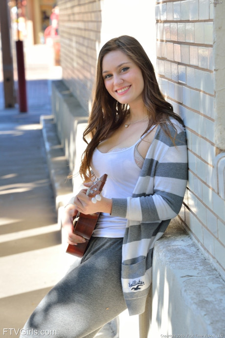 Bosomy babe Summer exposes her massive ass while playing a small guitar in public - #108483