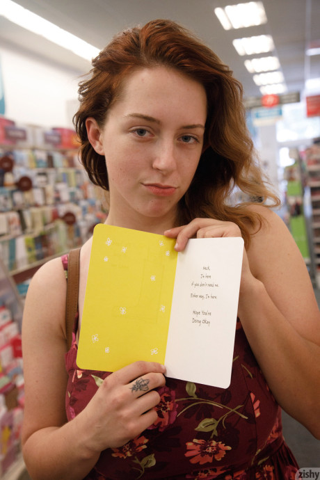Sleazy amateur girl Kelsey Berneray flashes her monster tits at the store