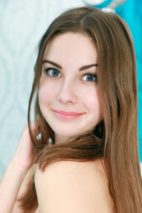 Adorable teenie Marta E shows her magnificent monstrous boobs and poses naked
