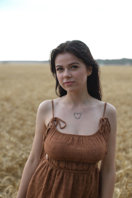 Breathtaking amateur babe Lyalya massages her monstrous breasts in a wheat field #5254