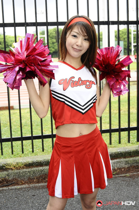 Japanese cheerleader Tomomi Matsuda gives a demonstration at a playground - #190888