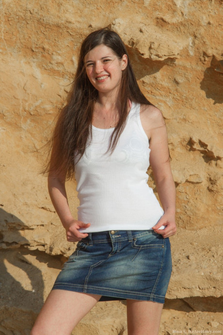 Squinting brunette Lima undresses in the sun to show silky behind at the beach - #74456