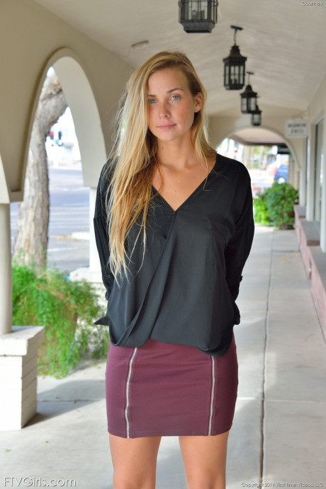Glamorous blondie in a miniskirt Courtney flaunting her nice titties in public - #76958