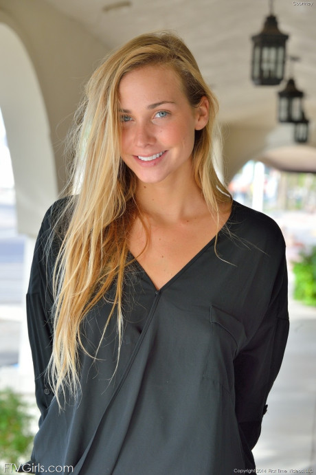 Glamorous blondie in a miniskirt Courtney flaunting her nice titties in public - #76959