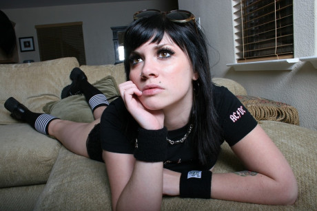 Black babe Andi shows her nice melons and trimmed twat on a couch - #20846