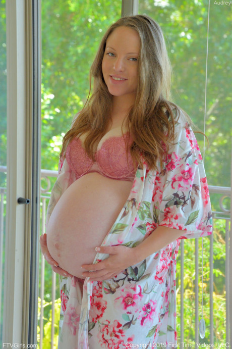 Pregnant babe Audrey loses panties and toys her tasty cunt on the bed - #3874