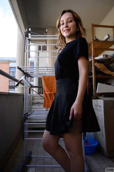 Italian beauty Meleida Tosca flashes her cunt before stripping nude at home - #256195