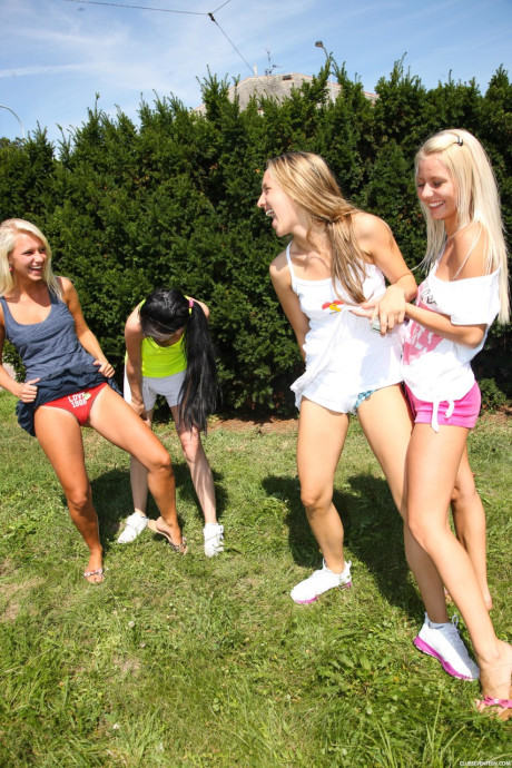 Four charming teens expose their skinny bodies and small breasts on roller blades - #195686