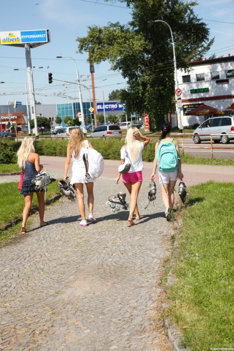 Four charming teens expose their skinny bodies and small breasts on roller blades - #195687