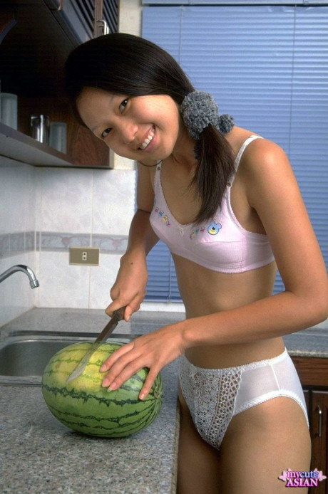 Sweet asian young removes lace lingerie while eating a watermelon - #221667
