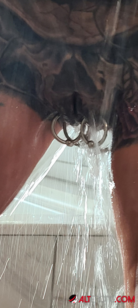 Tatted cougar lady Marie Bossette highlights her pierced cunt while showering - #32657