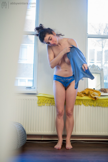 Undressed amateur Livia V is secretly filmed getting dressed by a hidden camera - #67917