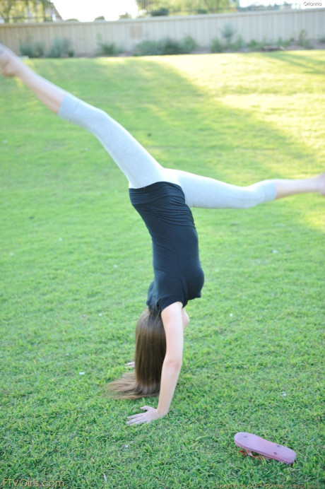 Amateur beauty with glasses Orianna gets naked while doing exercises outdoors - #160912