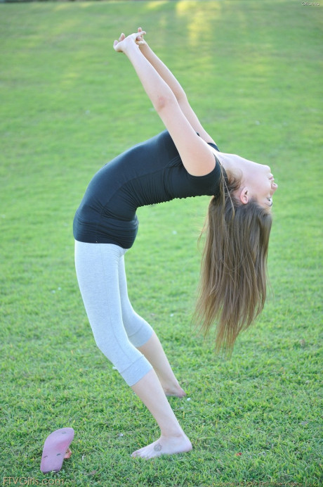 Amateur beauty with glasses Orianna gets naked while doing exercises outdoors - #160913