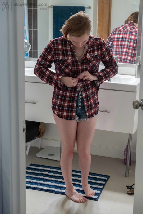 Attractive teenie with small boobs Annika gets spied on while dressing in the toilet - #110223