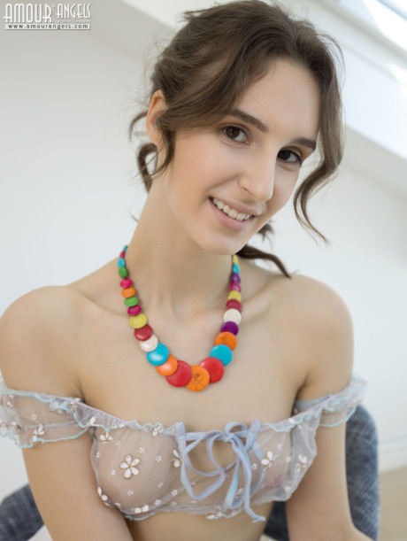 Young young sweety with long legs Milly gets totally undressed in her attic room - #76326