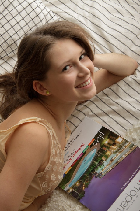 Attractive teenie amateur Melika slides down her fine lingerie and masturbates on a bed - #193882