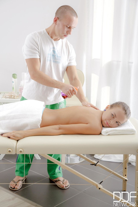 Brunette teenie Carre gets a massage before riding a masseur's cock - #194395