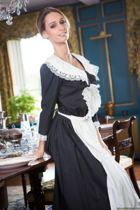 Enticing maid Erica Fontes does a striptease and shows off her round tits - #74006