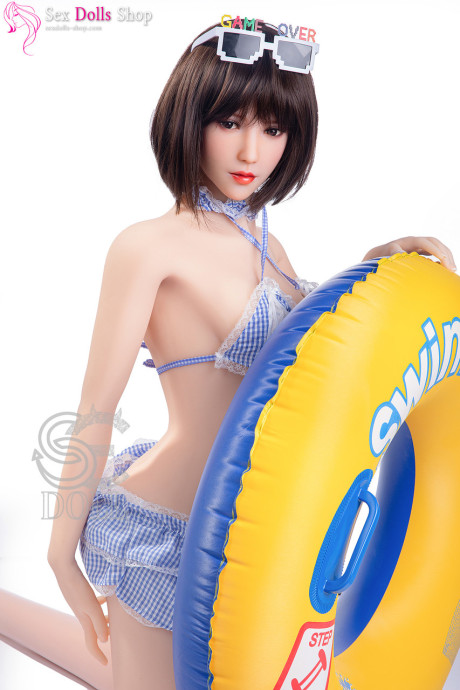 Gorgeous dark-haired sex doll shows off her amazing breasts & her curvy behind - #7199