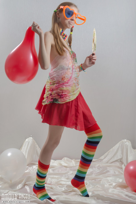 Thin young lady gf chick in pigtails and multi-colored socks takes off her clothes - #2255