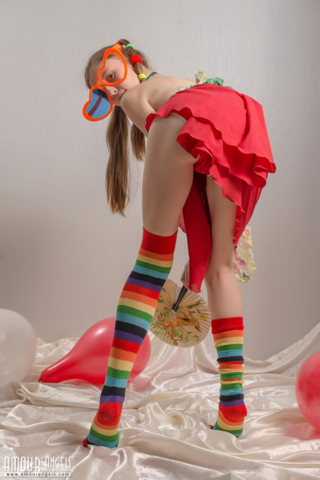 Thin young lady gf chick in pigtails and multi-colored socks takes off her clothes - #2257
